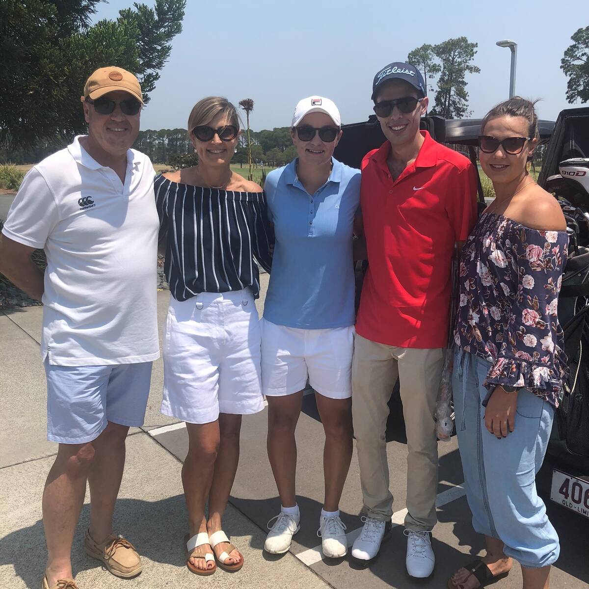 Make-A-Wish Australia wish kid George with family and tennis star Ash Barty