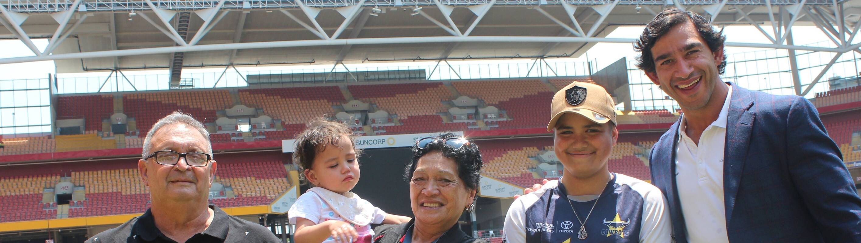 Brodi and his family with Johnathan Thurston