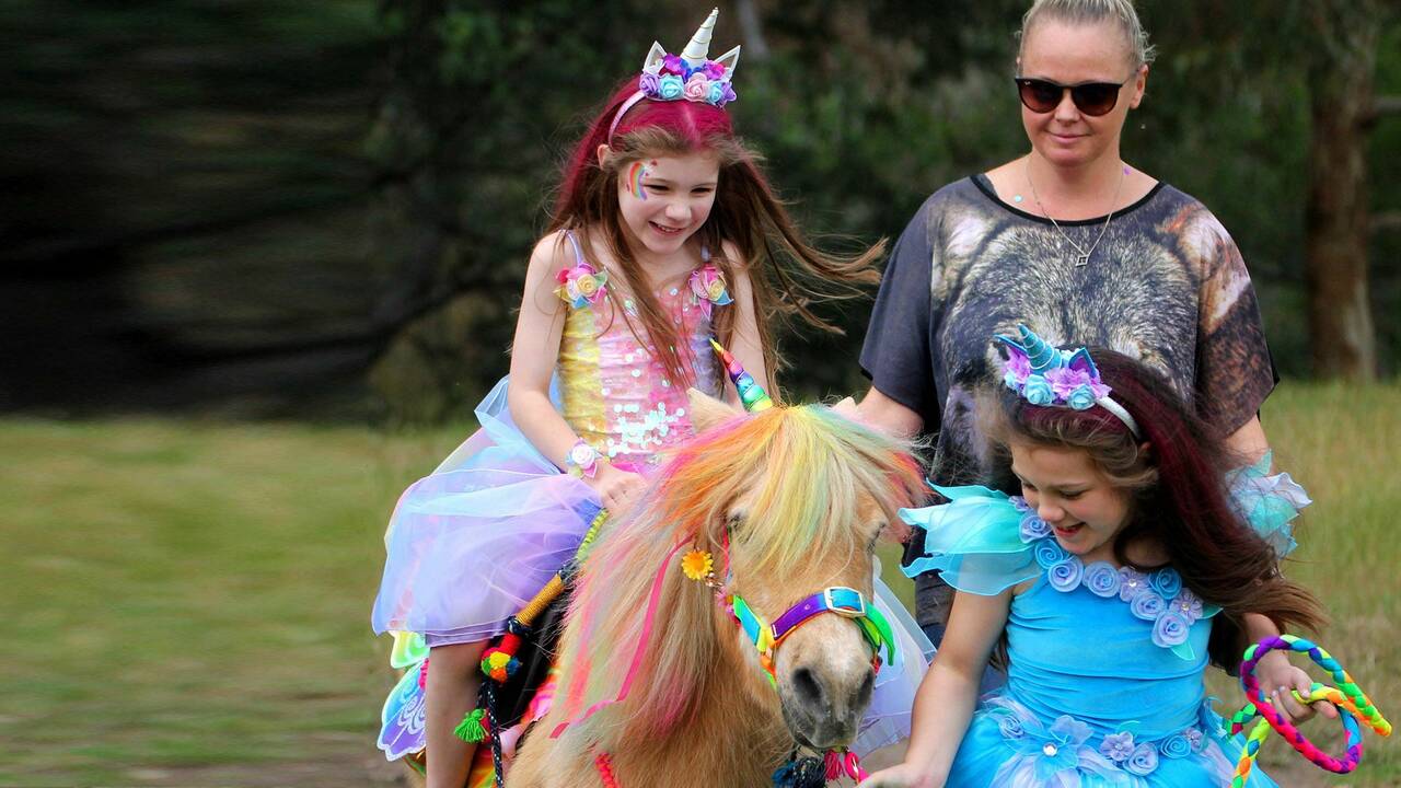 Make A Wish Australia Children's Charity - Abigail on her wish riding on a unicorn