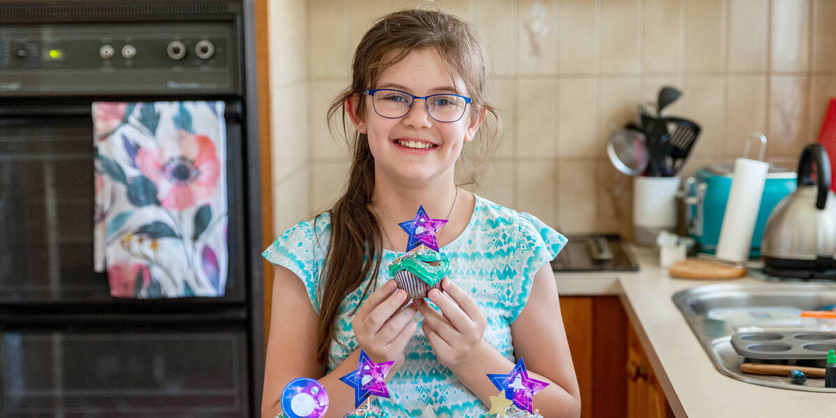 Make A Wish Australia Children's Charity - Abbey baking her galaxy cupcakes