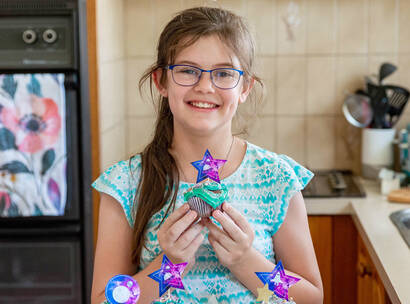 Make A Wish Australia Children's Charity - Abbey baking her galaxy cupcakes