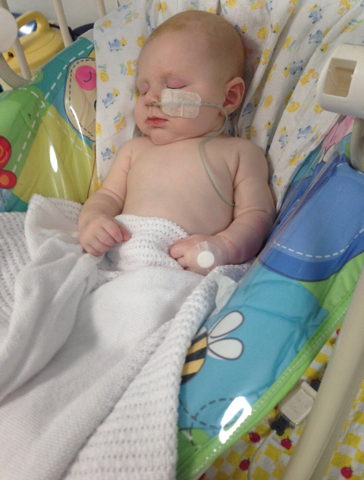 Make-A-Wish Australia wish kid Levi asleep in a cot in hospital