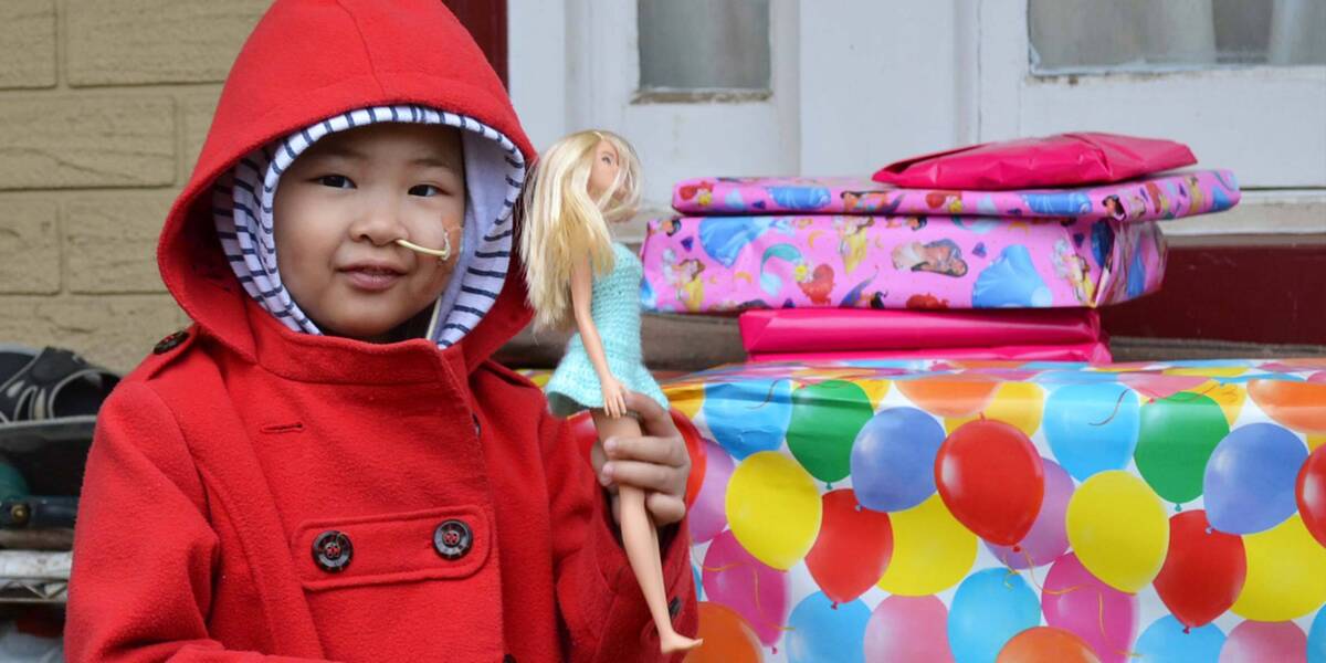 Make-A-Wish wish kid Maple with her Barbie
