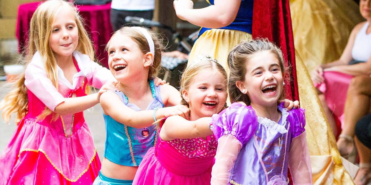 Make-A-Wish wish kid Savannah with her friends at her princess party wish