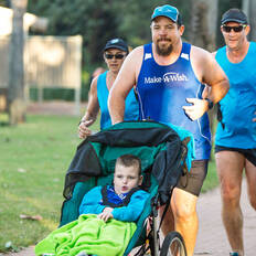 Make A Wish Australia Children's Charity - Aedan on his wish running with team wish and his dad