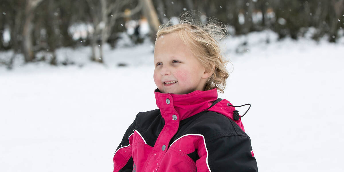 Make A Wish Australia Children's Charity - Isla on her wish in the snow seeing snow for the first time