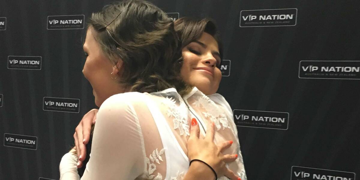 Make-A-Wish Australia wish kid Tara hugging Selena Gomez