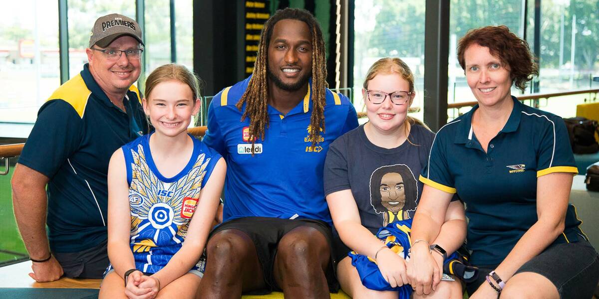 Make-A-Wish Australia wish kid Jacinta and family sat with Nic Naitanui in Perth