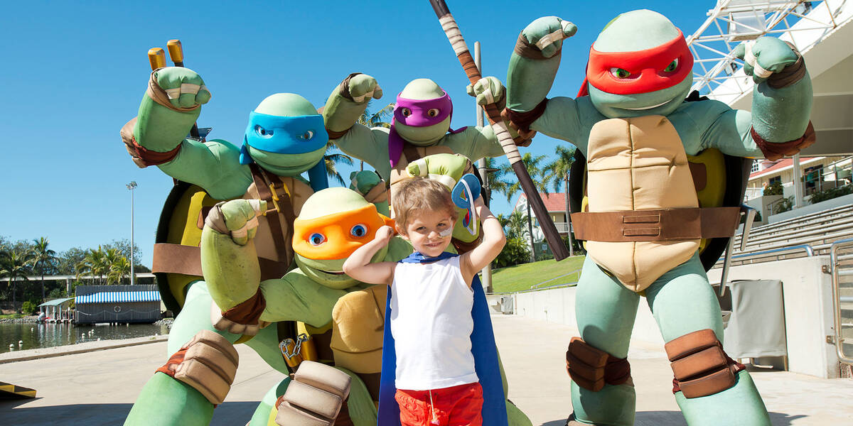 Make A Wish Australia Children's Charity - Kael on his wish with the teenage mutant ninja turtles