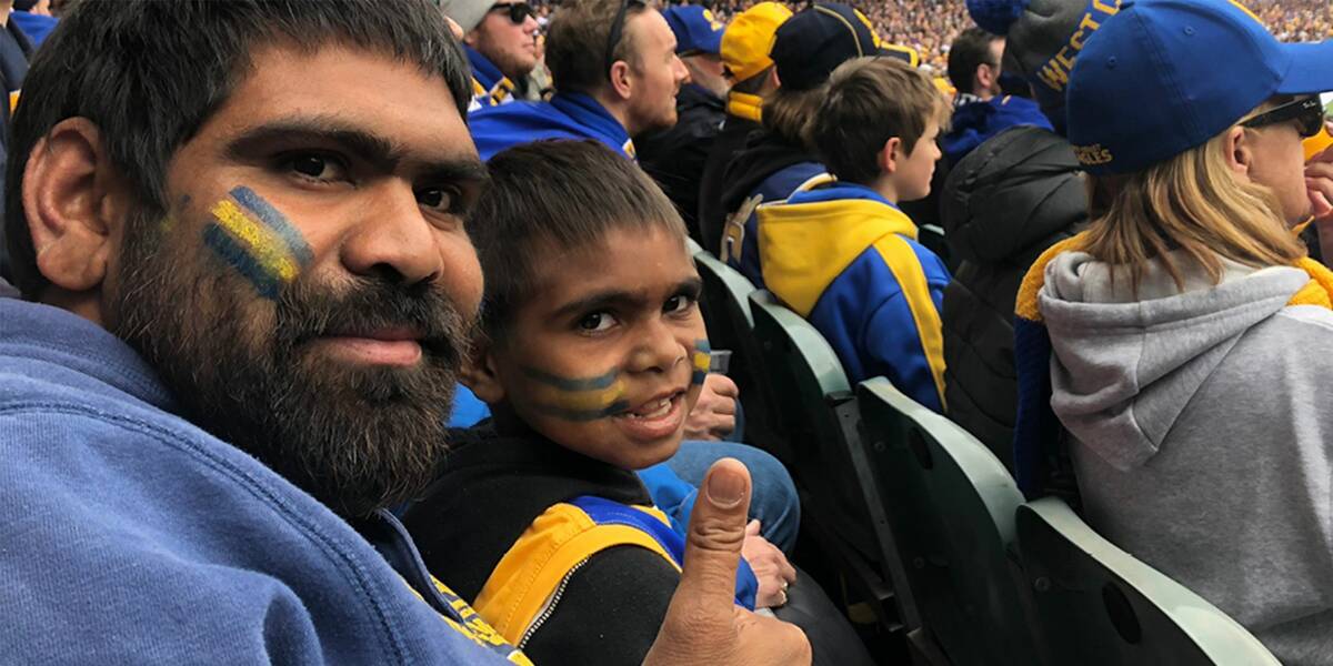 Make A Wish Australia Children's Charity - Edgar on his wish with his dad watching the West Coast Eagles AFL game