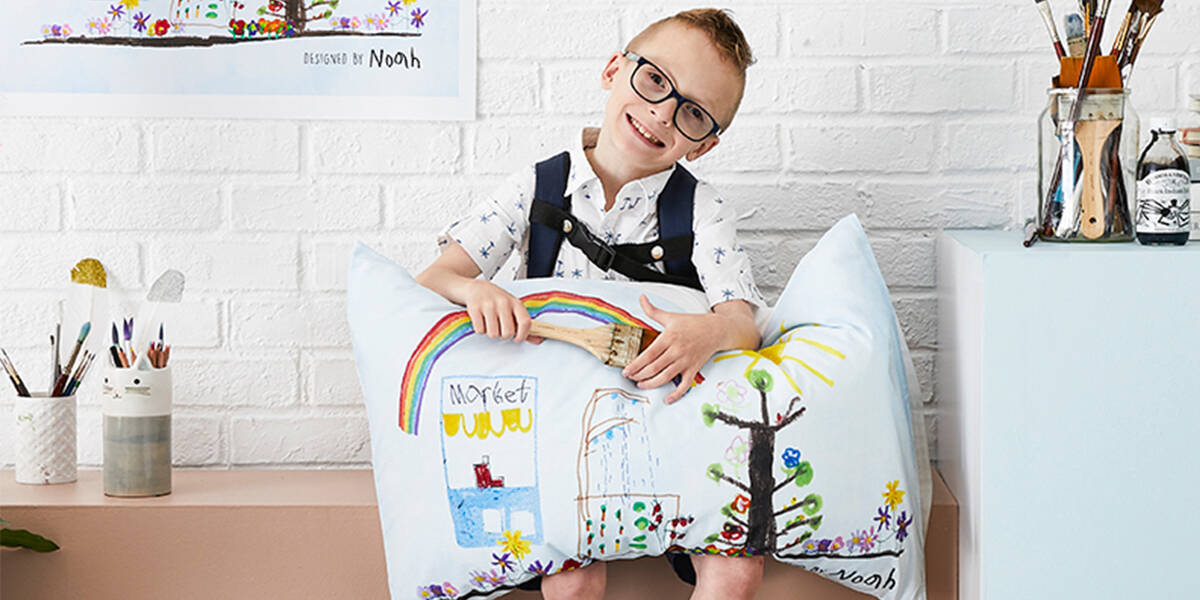 Make A Wish Australia Children's Charity - Noah with his Adairs pillow case he designed