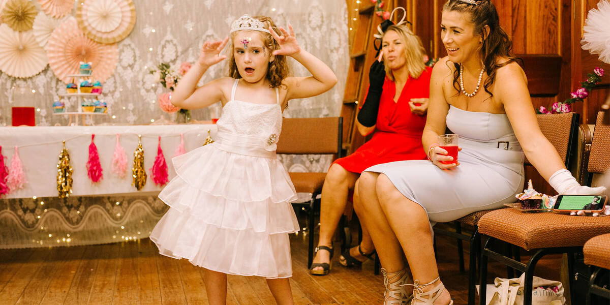 Make A Wish Australia Children's Charity - Emma on her wish dressed as a princess posing to the camera