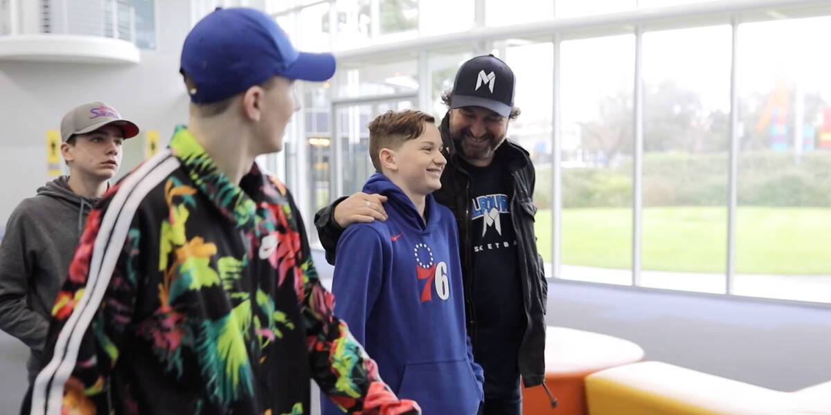 Make-A-Wish Australia wish kid Claude with family after his basketball wish meeting Ben Simmons