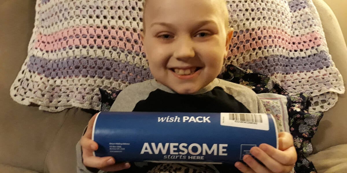 Make-A-Wish Australia wish kid Manny with his wish pack