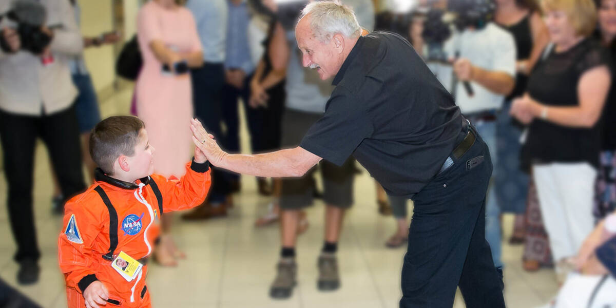 Dwayne high fives his Grandad on his wish