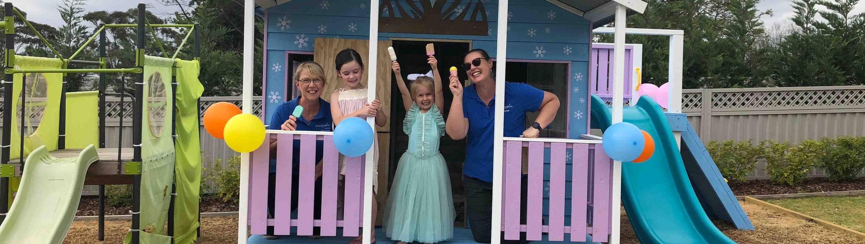 Make-A-Wish Australia wish kid Penelope celebrates in her new Frozen themed cubby house with volunteers