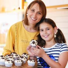 Mum and daughter in the kitchen with their Bake A Wish puppy cupcakes