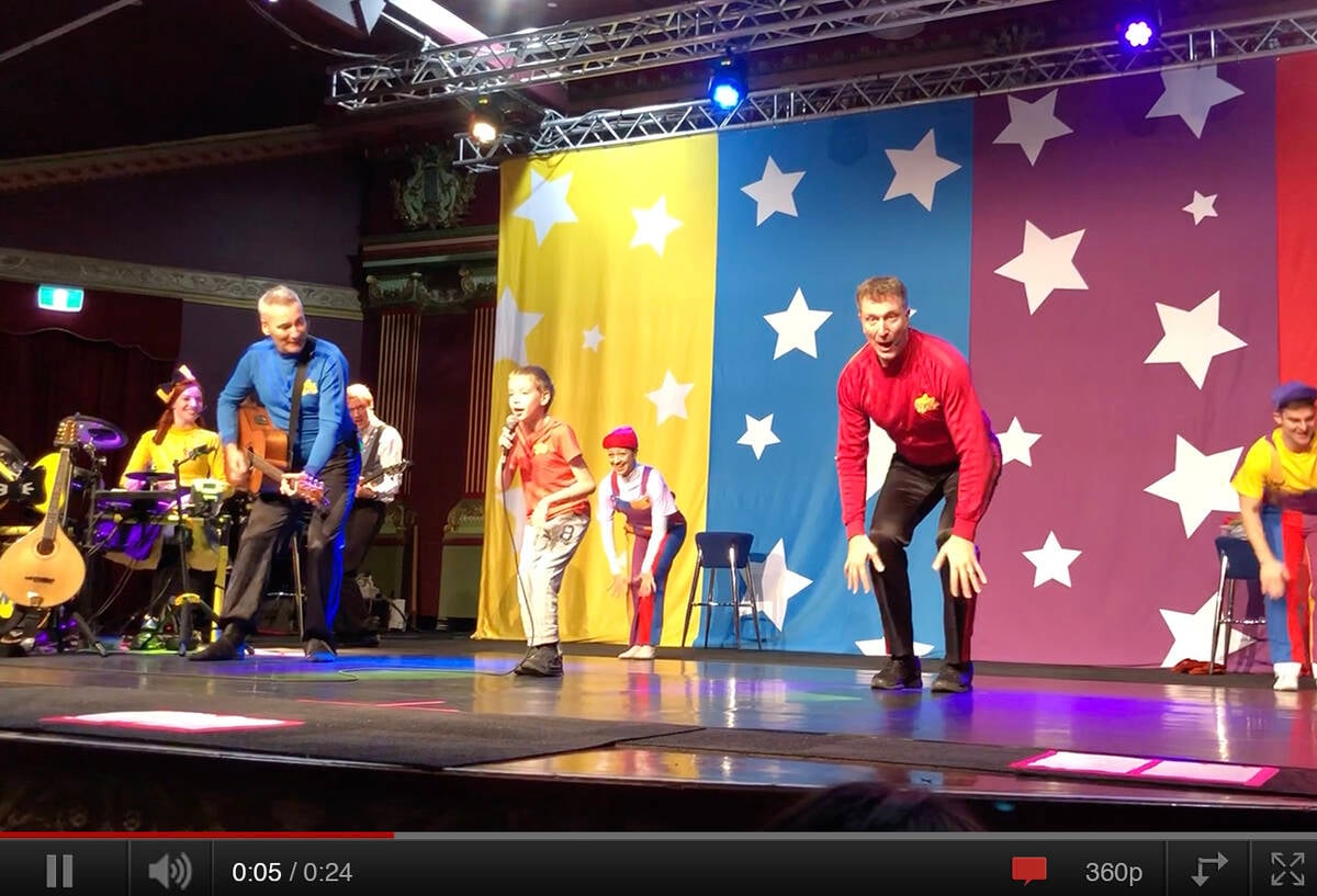 Make-A-Wish Australia wish kid Ben dancing on stage with The Wiggles