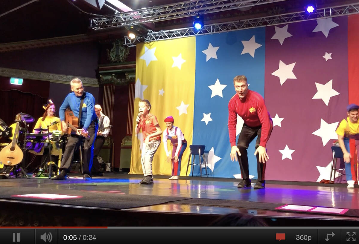 Make-A-Wish Australia wish kid Ben dancing on stage with The Wiggles